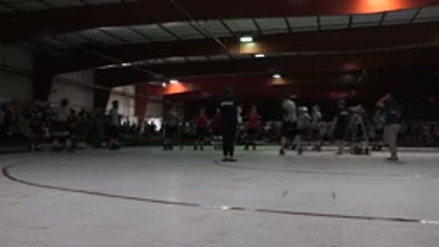 DENVER COLORADO-2015: Skaters Form Circle at Roller Rink Competition