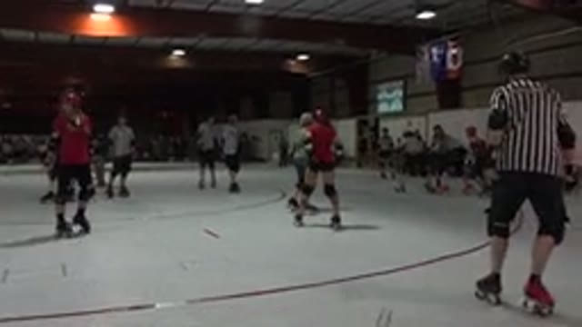 DENVER COLORADO-2015: Lady Skaters Compete In Roller Derby Contest In Small Arena