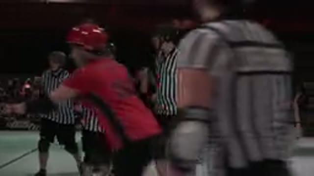 DENVER COLORADO-2015: Roller Derby Female Match Green Team Against Red Players