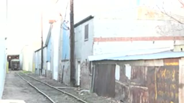 DENVER COLORADO-2015: Dilapidated Buildings With Railroad Tracks Next To Them