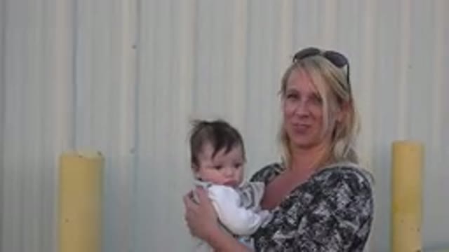 DENVER COLORADO-2015: Mom And Baby Standing Around And Talking