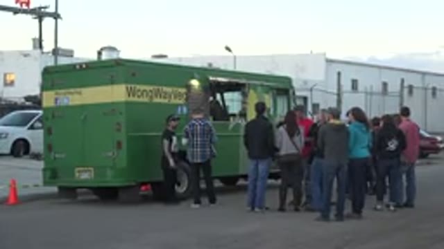 DENVER COLORADO-2015: Many People Buying Same Food In A Food Truck On The Street