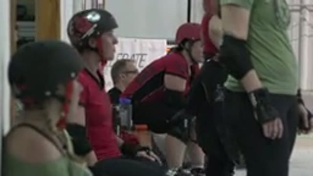DENVER COLORADO-2015: Coed Team Of Skaters Returns To Sit After Coming Off Rink