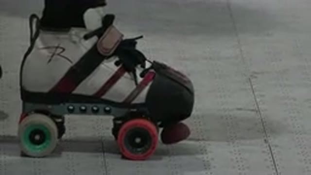 DENVER COLORADO-2015: Rollers With Green And Red Wheels Being Filmed While In Motion
