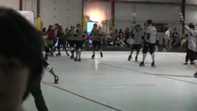 DENVER COLORADO-2015: A Group Of People Roller Skate At A Roller Skating Rink