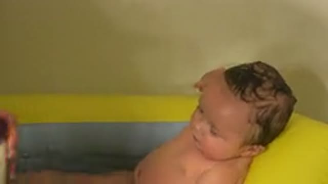 WESTMINSTER COLORADO-2015: Bath Time For The Cute Bubbly Newborn Baby
