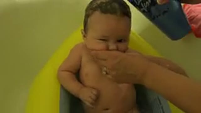 WESTMINSTER COLORADO-2015: A Mother Shampooing Her Baby's Hair in Mini