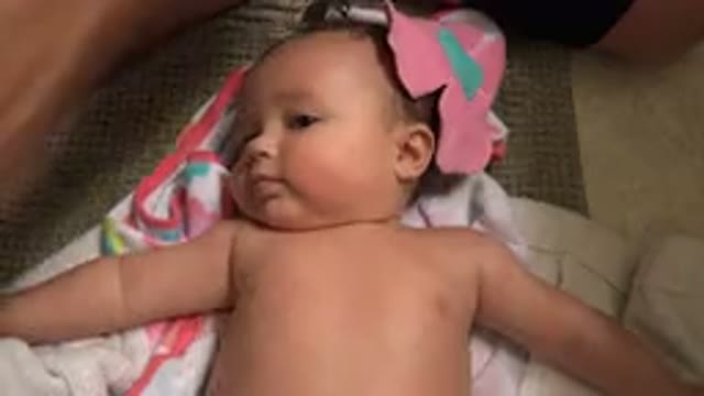 WESTMINSTER COLORADO-2015: A Baby Is Being Caressed By Its Parent In The