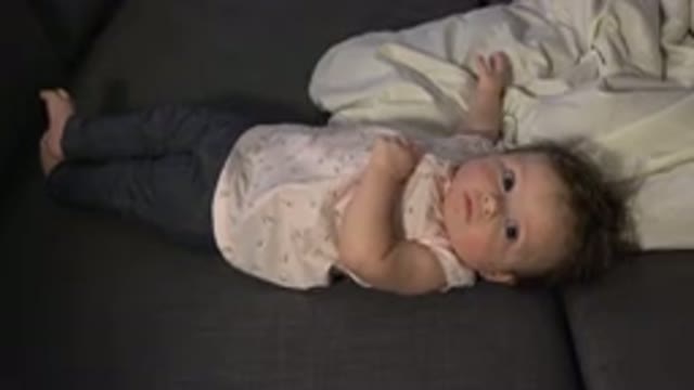 WESTMINSTER COLORADO-2015: White Baby Sleeping in Bed Looking Around