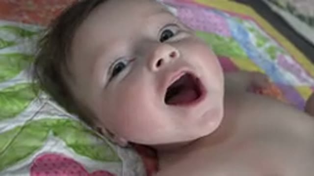 WESTMINSTER COLORADO-2015: A Little Child Who Laughs Happy And Naked On A Bed