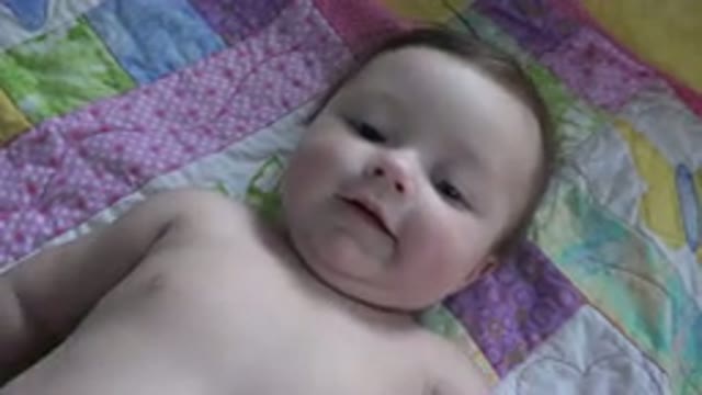 WESTMINSTER COLORADO-2015: Baby Lies On Pink And Purple Quilt