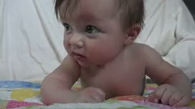 WESTMINSTER COLORADO-2015: A Lovely Baby Lying on a Bed Without Clothes