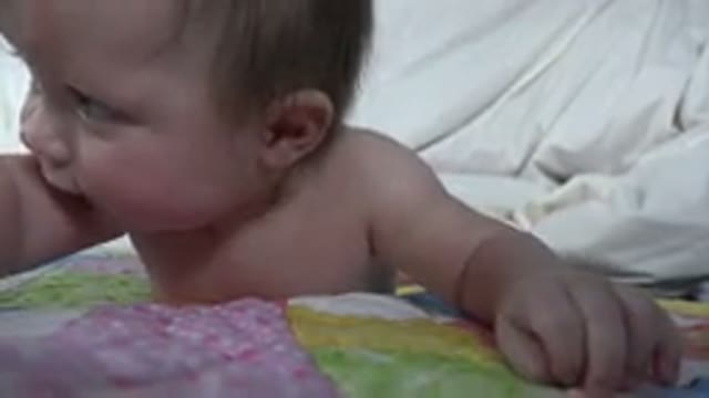 WESTMINSTER COLORADO-2015: Baby Laying On A Blanket And Trying To Move Around