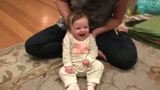 WESTMINSTER COLORADO-2015: Baby in White Dress Playing with Woman