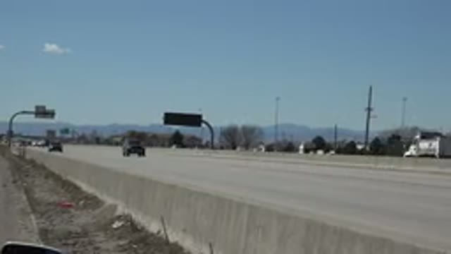 DENVER COLORADO-2015: Cars Driving On A Road During Day