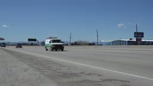 DENVER COLORADO-2015: Light Highway Traffic On A Clear Sunny Day