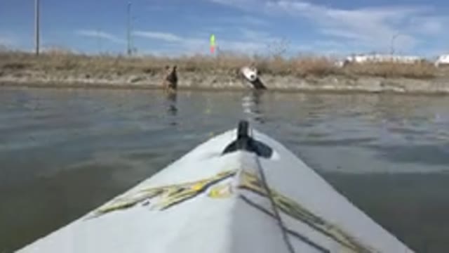 HIDDEN LAKE COLORADO-2015: A Boat Floating Around In The Water On A Sunny Day