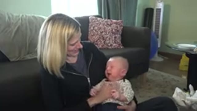 HIDDEN LAKE COLORADO-2015: Mom Playing On The Floor With Her Baby Boy At Home