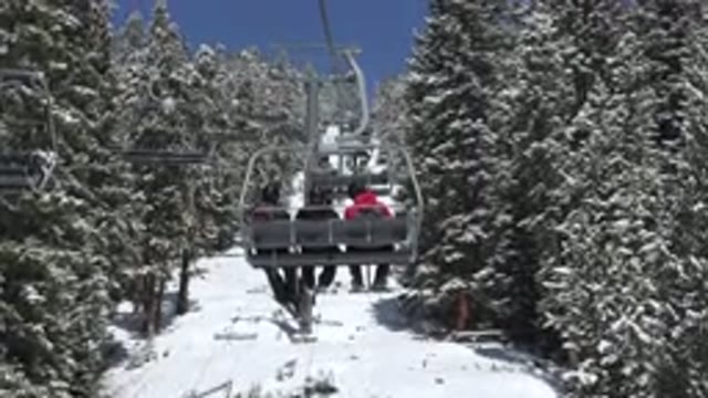 KEYSTONE COLORADO-2015: People On Ski-Lift Through The Mountains