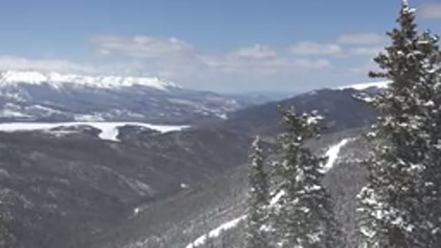 KEYSTONE COLORADO-2015: Snow Capped Mountainous Terrain Off In The Distance