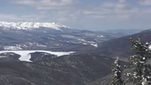 KEYSTONE COLORADO-2015: Panoramic Man With Ski Equipment On Snow-Covered Mountain