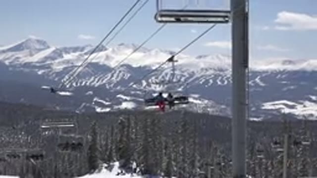 KEYSTONE COLORADO-2015: Snow Covered Mountains And People Riding In Ski Lift On