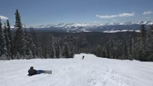 KEYSTONE COLORADO-2015: Snowy Mountain Side With Pine Trees On The Side