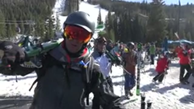 KEYSTONE COLORADO-2015: Man in Ski Suit Talking to Camera on Mountain