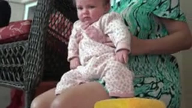 WESTMINSTER COLORADO-2015: A Blonde Woman Sitting a Baby Girl on Her Lap