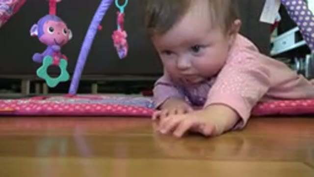 WESTMINSTER COLORADO-2015: Small Toddler in Pink Pajamas Playing in Park