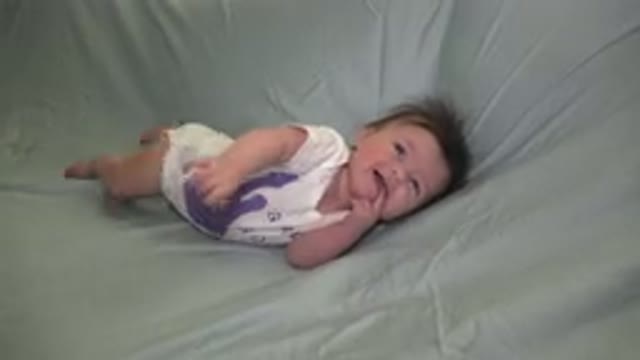 WESTMINSTER COLORADO-2015: Cute Baby Girl In Baby Grow Desperately Trying To