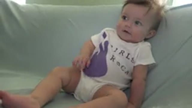 WESTMINSTER COLORADO-2015: Adorable Newborn Baby Watching On The Couch