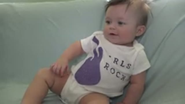 WESTMINSTER COLORADO-2015: Baby Sitting On Sofa Moving Legs Smiling And Interacting