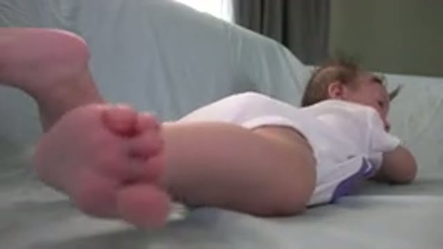 WESTMINSTER COLORADO-2015: Baby Laying On A Couch And Moving Around