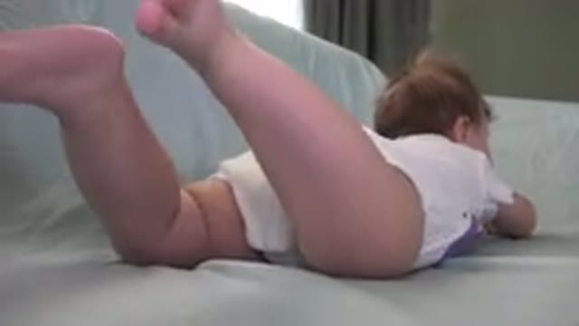 WESTMINSTER COLORADO-2015: Baby On A Sheet Dressed In White Kicking Actively