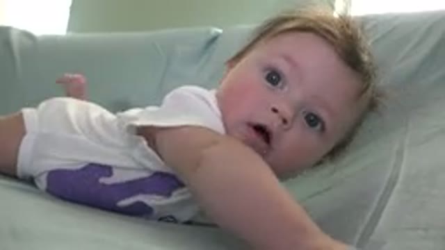 WESTMINSTER COLORADO-2015: Baby Boy With Light Eyes Playing And Learning To Crawl