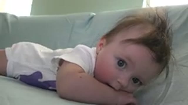 WESTMINSTER COLORADO-2015: Little Baby With Blue Eyes On The Bed