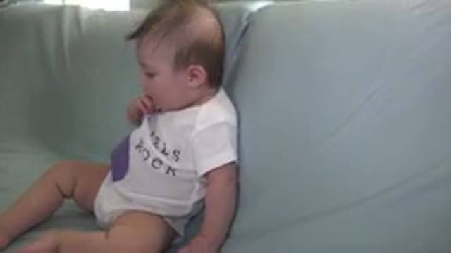 WESTMINSTER COLORADO-2015: Baby Sitting On Couch Sucking On Her Hand