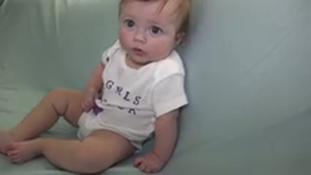 WESTMINSTER COLORADO-2015: Cute Baby Boy Sitting Alone On A Couch