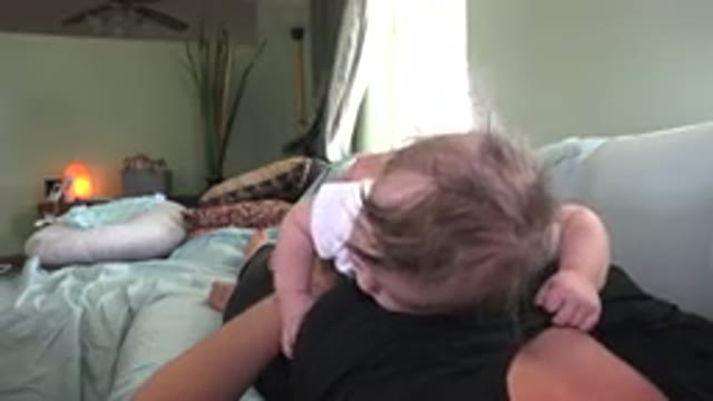 WESTMINSTER COLORADO-2015: Baby Listening To Mothers Heartbeat By Resting Head