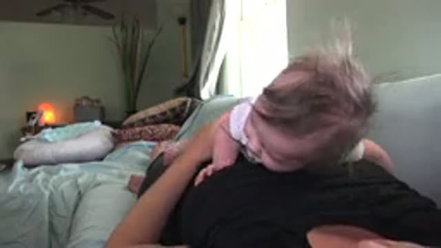 WESTMINSTER COLORADO-2015: Baby Wearing White Pampered By A Woman Who Wears A Black Shirt