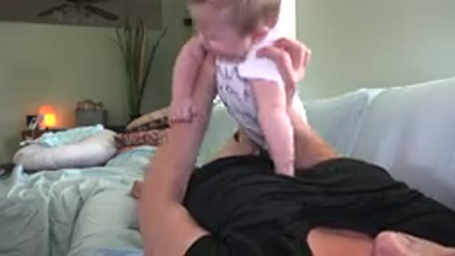 WESTMINSTER COLORADO-2015: Adorable Cute Baby Playing With His Mother