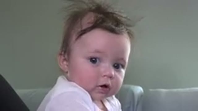 WESTMINSTER COLORADO-2015: Baby With Crazy Hair Indoors Looking at Camera