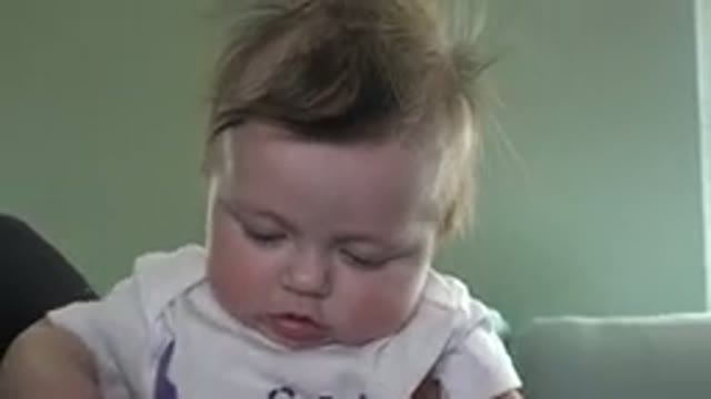 WESTMINSTER COLORADO-2015: Person Holding Baby Who Is Looking Forward