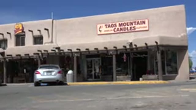 TAOS NEW MEXICO-2015: Car Sitting In A Strip Mall Parking Lot On A Nice Day