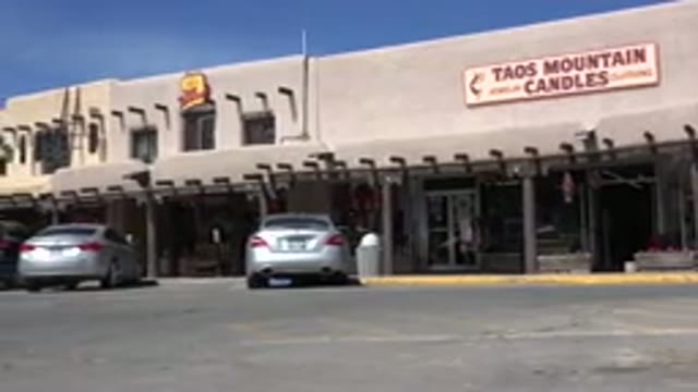 TAOS NEW MEXICO-2015: Facade Of A Commercial Establishment With Several Cars