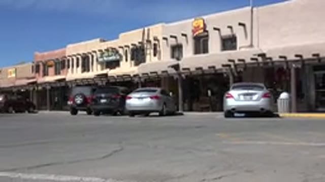 TAOS NEW MEXICO-2015: Parked Cars In Front Of Stores On A Sunny Day
