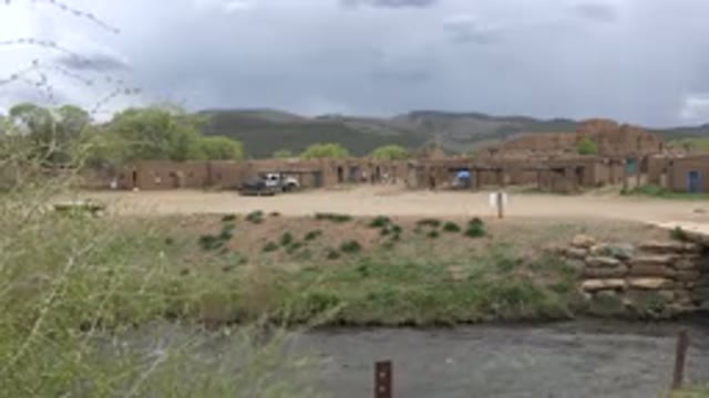 TAOS NEW MEXICO-2015: Water Flowing Through The Stream Next To A Place With Sand