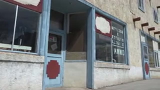 TAOS NEW MEXICO-2015: Camera Panning Slowly To The Right On An Abandoned Gun Store