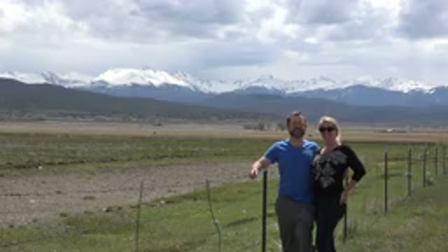 TAOS NEW MEXICO-2015: Man And Wife Standing In Front Of Snow Landscape